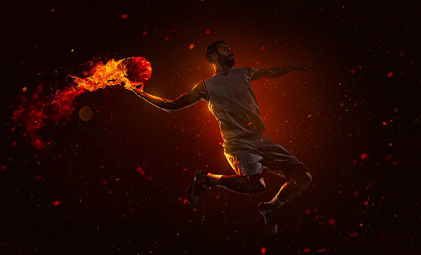 istock Professional basketball player with fireball 530974467