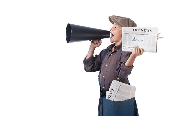 Newsboy holding paper and Shouting With Megaphone stock photo