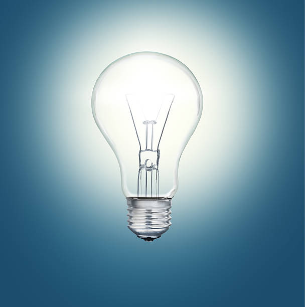 istock Light bulb shines in the darkness bright light 530975109