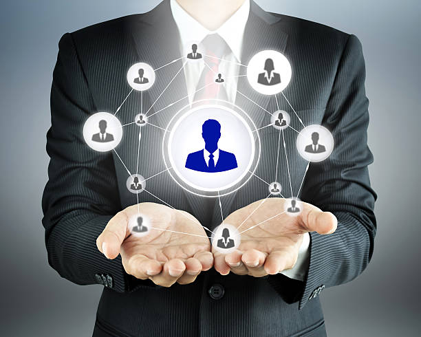 istock Hands carrying businesspeople icon network 530975801