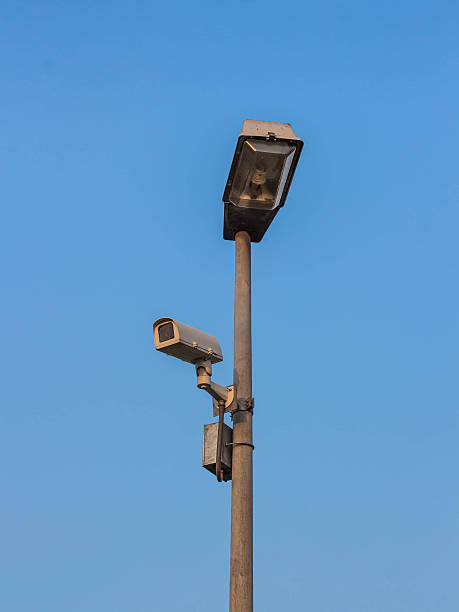 istock CCTV camera spying down onto the world below 530976071