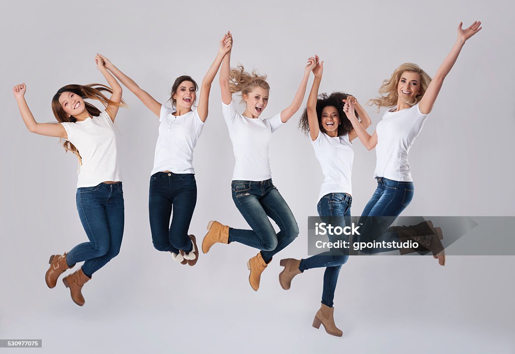 Feier der Erfolg von jumping bis - Lizenzfrei Frauen Stock-Foto