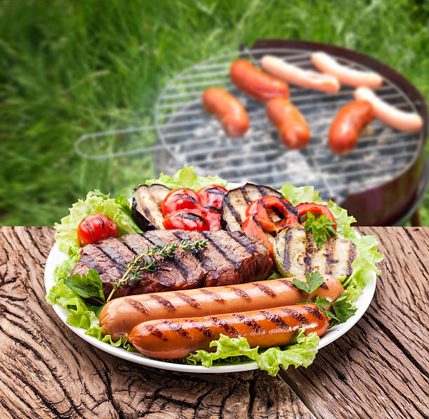 istock steak, sausage and vegetable 530981145