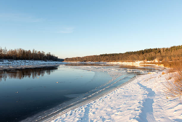 istock beautiful snowy winter landscape with frozen river 530981821