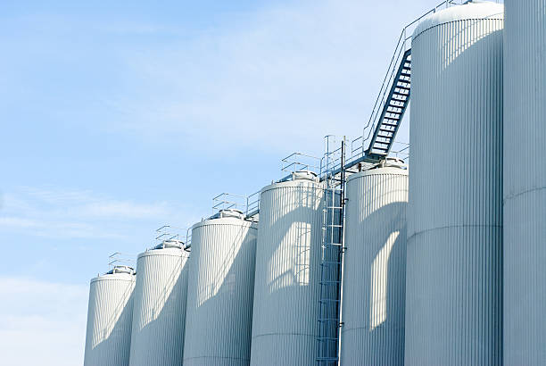 istock brewery tanks blue sky big containers beer production industry 530982887