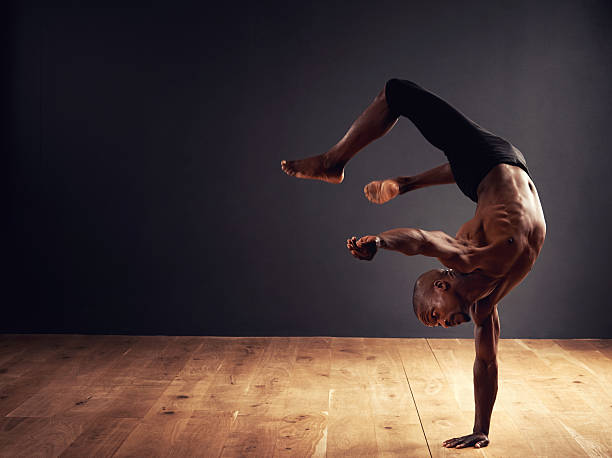 Dedication, passion, commitment Male dancer performing an acrobat movehttp://195.154.178.81/DATA/shoots/ic_784287.jpg individual event stock pictures, royalty-free photos & images