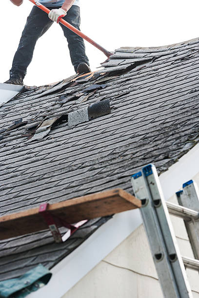 istock Old asphalt roof shingles being removed for replacemnt 530984648