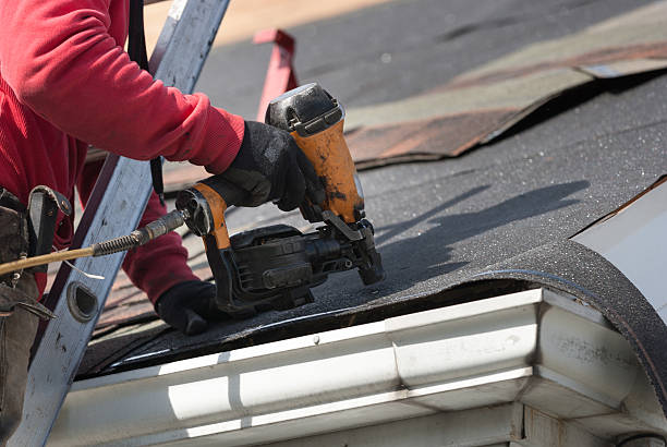 istock roofers installing new roof on house 530984806