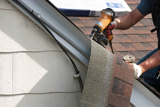 istock roofers installing new roof on house 530984840