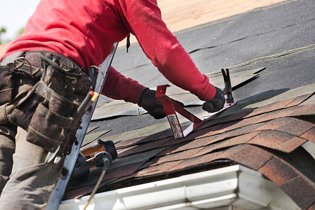 istock roofers installing new roof on house 530984852