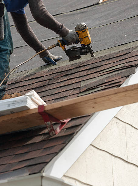 istock roofers installing new roof on house 530984858