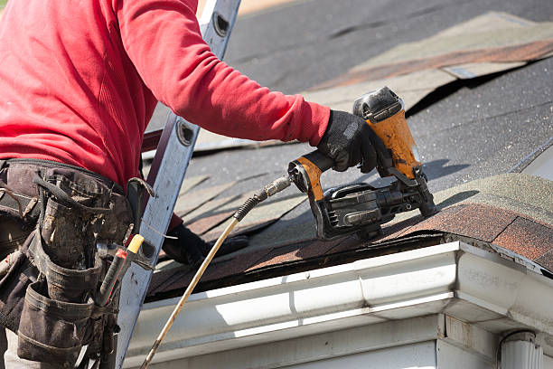 istock roofers installing new roof on house 530984864