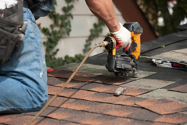 istock roofers installing new roof on house 530984880