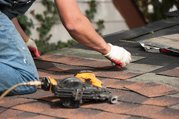 istock roofers installing new roof on house 530984882