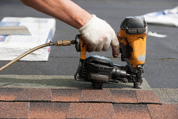 istock roofers installing new roof on house 530984898