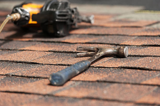 istock roofers installing new roof on house 530984962
