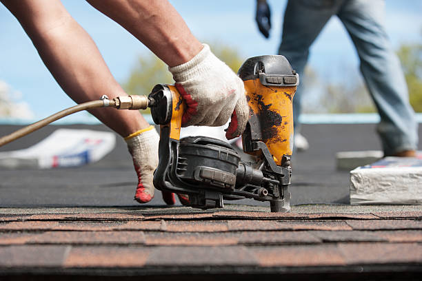 istock roofers installing new roof on house 530984978