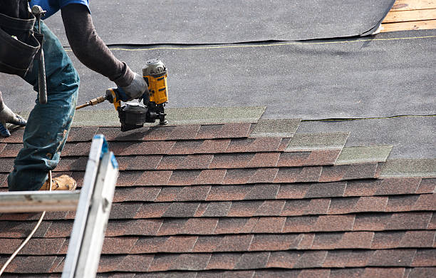 istock roofers installing new roof on house 530984988