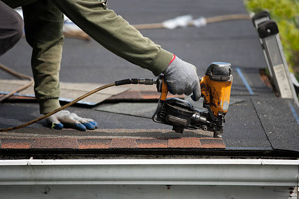 istock roofers installing new roof on house 530984990