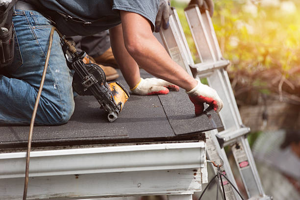 roofers installing new roof on house roofers installing a new roof on residential home. weatherlock material and brown asphalt roofing shingles wood shingle photos stock pictures, royalty-free photos & images
