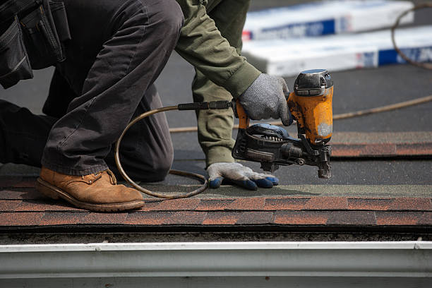 istock roofers installing new roof on house 530985038