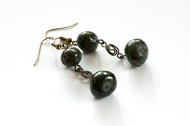 istock Hand crafted earrings with black stones 530985555