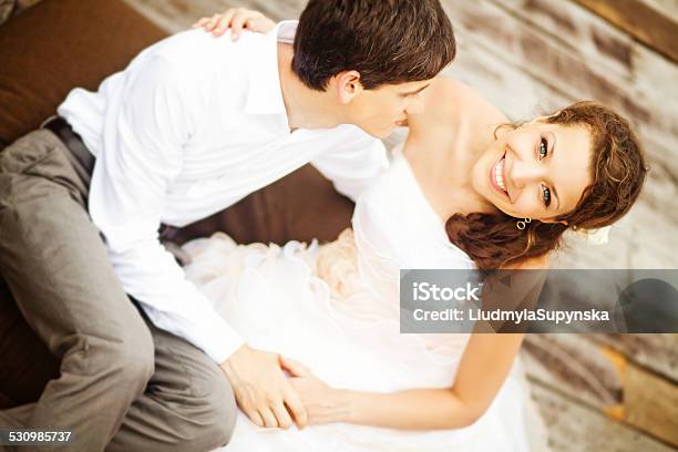 Happy Bride And Groom Hugging Stock Photo - Download Image Now - 2015, Adult, Adults Only