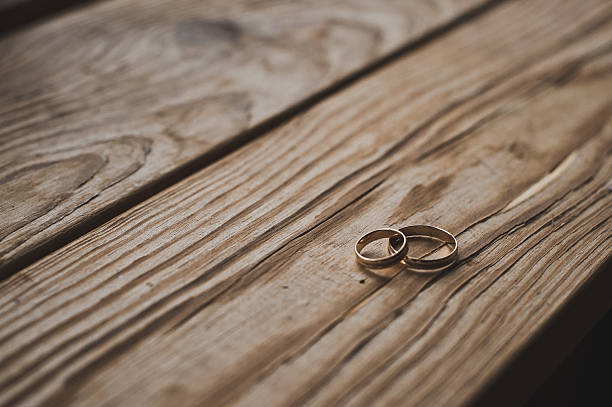 istock Gold wedding rings on the boards 530986206