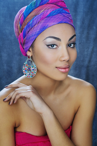 Young African beauty in ethnic headpiece