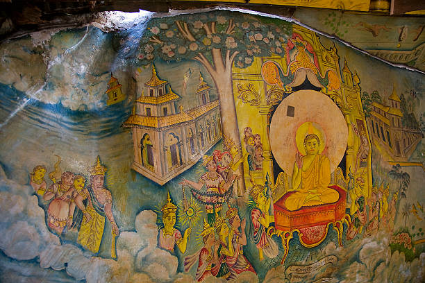 istock painted on stone with buddha  in Cave temple in Milkirigala 530986819