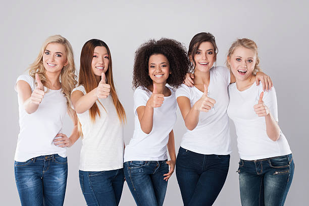istock Multi ethnic girls with thumb up 530986831
