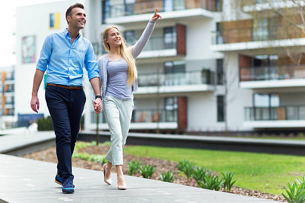 istock Young couple in modern residential area 530988490