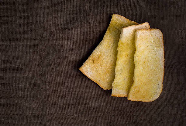 istock Toast, butter, and sprinkle with sugar. 530988716