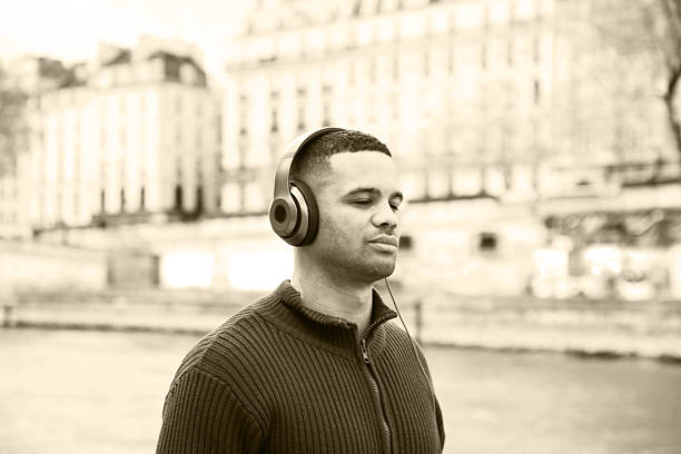 istock young black man relaxing in Paris 530990952