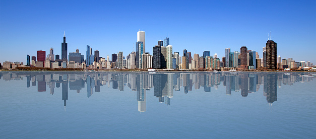 Wide view of Chicago with reflection on the water