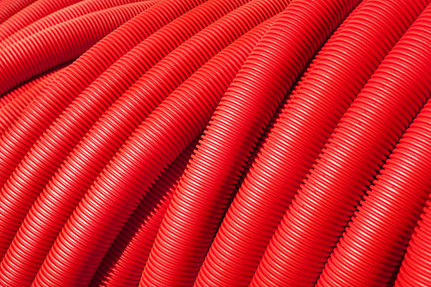 istock Tubing. Red plumbing pipe close-up. 530993726
