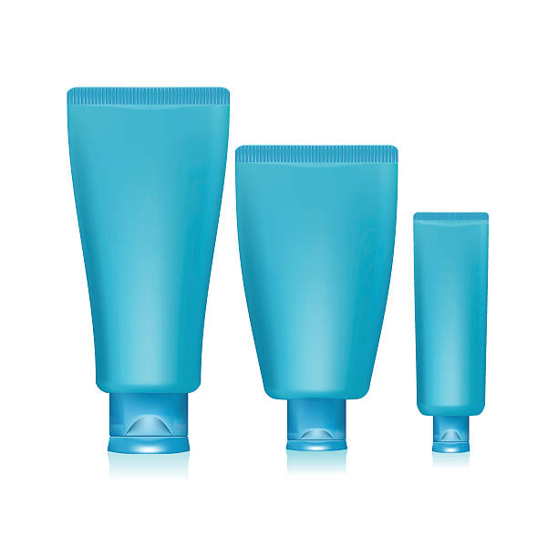 istock Illustration of blue tubes and cap for cream isolated 530995455