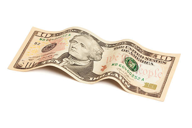 istock Ten dollar bill isolated with clipping path 530996661