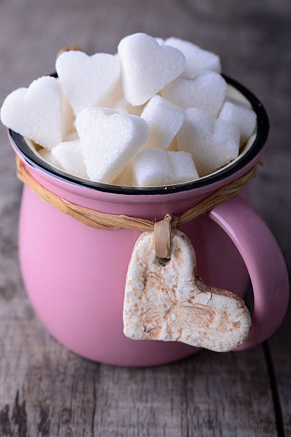 istock pink mug with sugar hearts 530997667