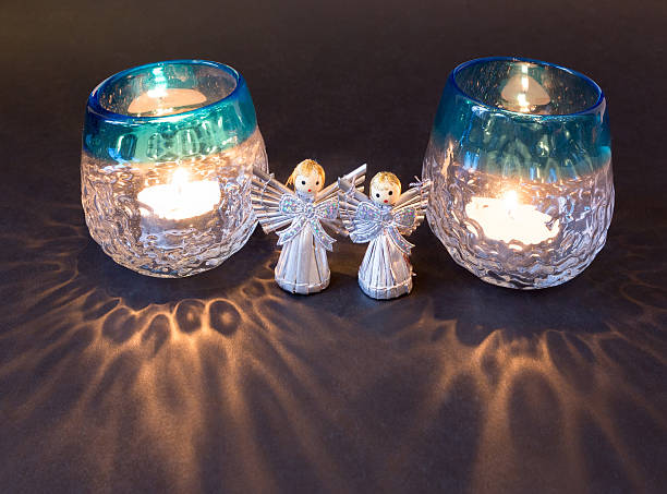 Two little angels and tea lights for christmas