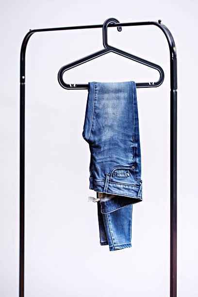 Blue jean on the hanger stock photo