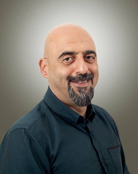 istock Portrait of man on gray background 530998533