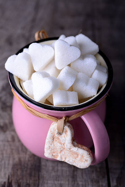 istock pink mug with sugar hearts 530998803