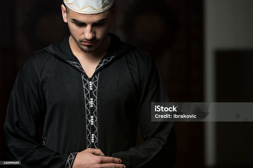 Humble Muslim Prayer Young Muslim Guy Making Traditional Prayer To God While Wearing A Traditional Cap Dishdasha Adult Stock Photo