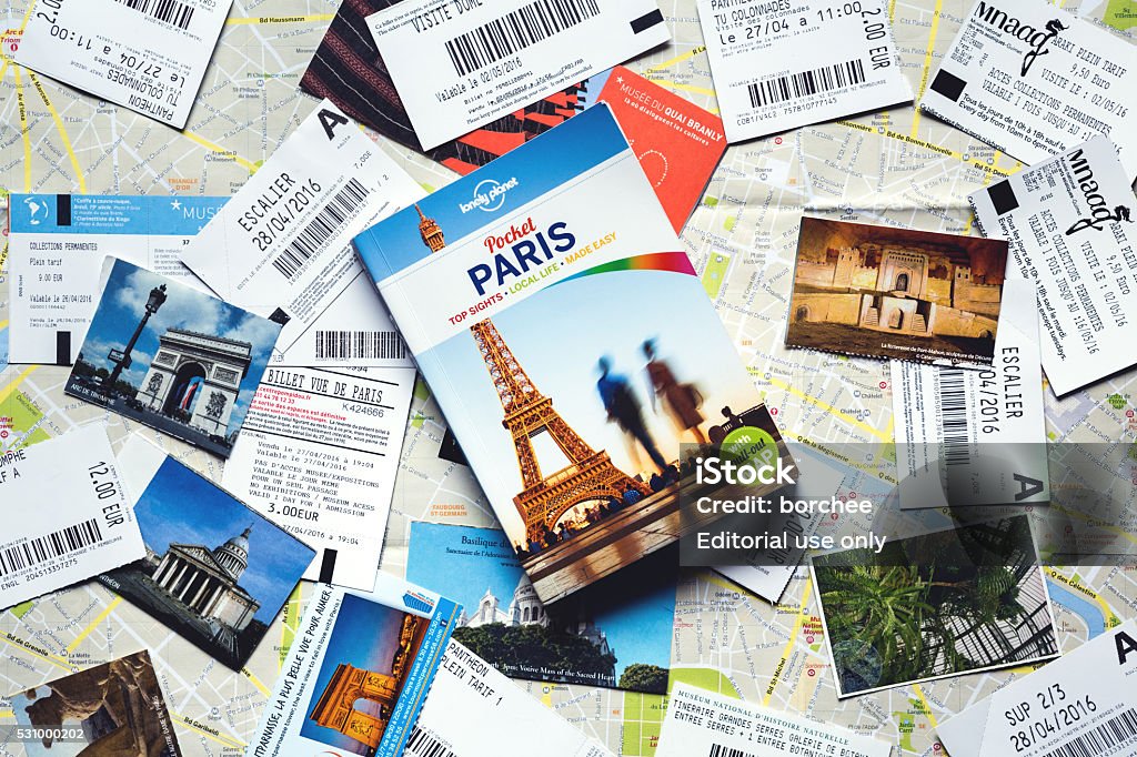 Paris Guide With Tickets From Paris Stock Photo - Download Image Now -  Travel, Guidebook, Guidance - Istock