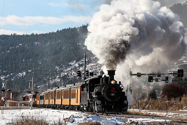 istock Narrow Gauge Train Crossing a Road 531000391