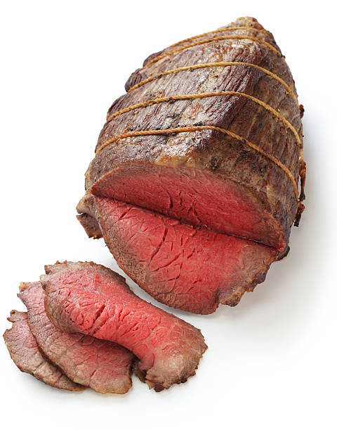 roast beef roast beef isolated on white background roast beef photos stock pictures, royalty-free photos & images