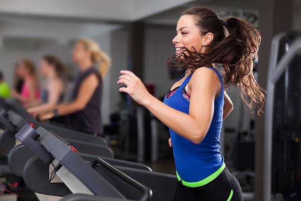 istock Beautiful brunette on a treadmill 531000758