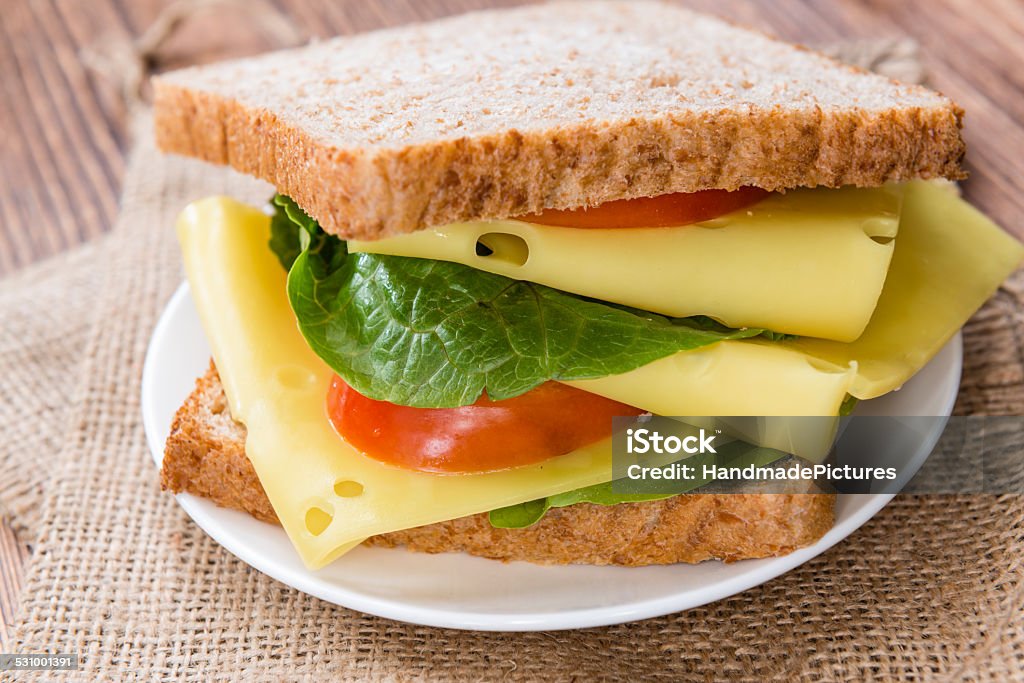 Fresh made Cheese Sandwich Fresh made Cheese Sandwich on an old rustic wooden table Cheese Sandwich Stock Photo