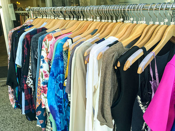 istock Women's clothes hanging on a clothing rack 531008374